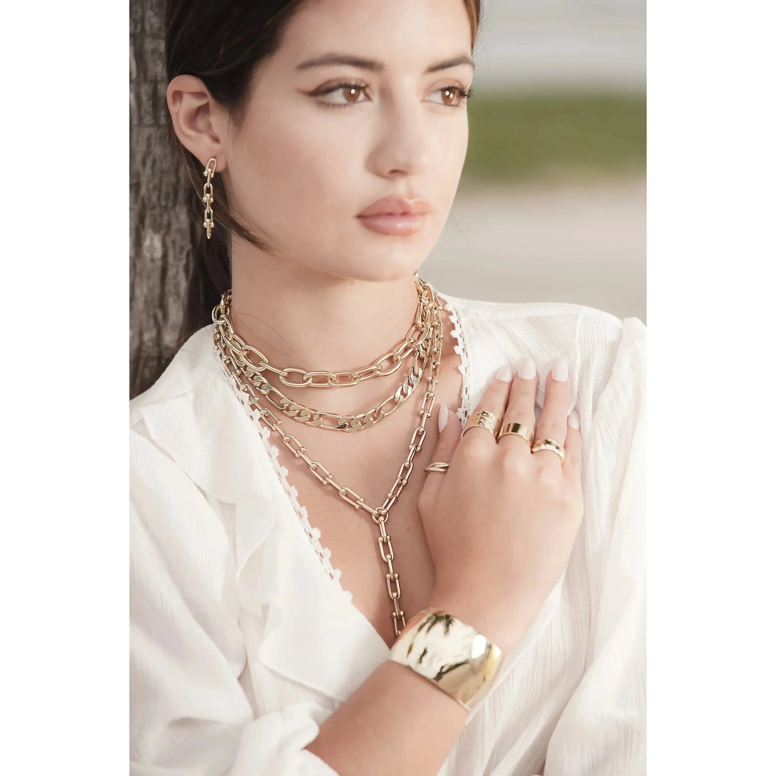 Shiny 14k gold large domed cuff bracelet with high Polish finish for elegant style